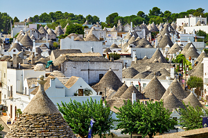 Apulia Puglia Italy. Alberobello. Trulli: traditional Apulian dry stone huts with a conical roof.