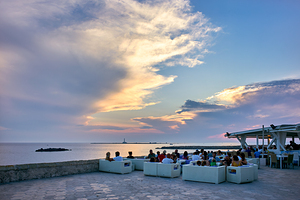 Salento. Apulia Puglia Italy. Gallipoli. Aperitif on the seafront at sunset