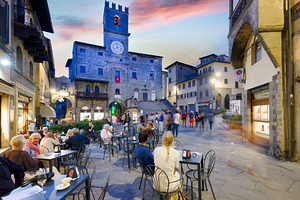 Cortona Arezzo Tuscany Italy. Palazzo del Popolo in Piazza della Repubblica at sunset
