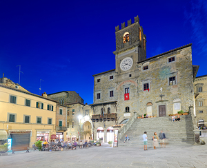 Cortona Arezzo Tuscany Italy. Palazzo del Popolo in Piazza della Repubblica at sunset