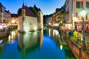 Annecy Haute Savoie France. The Palais de lIsle and Thiou river at sunset