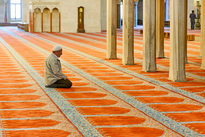 Istanbul Turkey. Süleymaniye Mosque. Believers praying