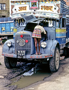 Nepal. Kathmandu. Repairing a truck