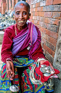 Nepal. Kathmandu. Old woman selling jewels