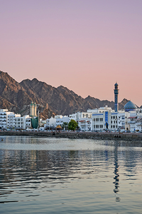 Oman. Muscat. Cityscape at sunset