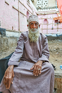 Oman. Muscat. Portrait of omani men
