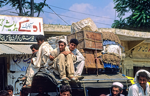 Pakistan. Adults men in the streets of Peshawar