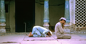 Pakistan. Praying in the mosque of Chitral