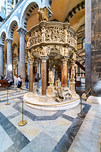 Pisa Tuscany Italy. The pulpit sculpted by Giovanni Pisano inside the Cathedral