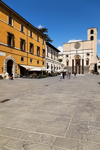 Todi Umbria Italy. Concattedrale della Santissima Annunziata. Cathedral. Piazza del Popolo. The statue Quattro Stele by Arnaldo Pomodoro