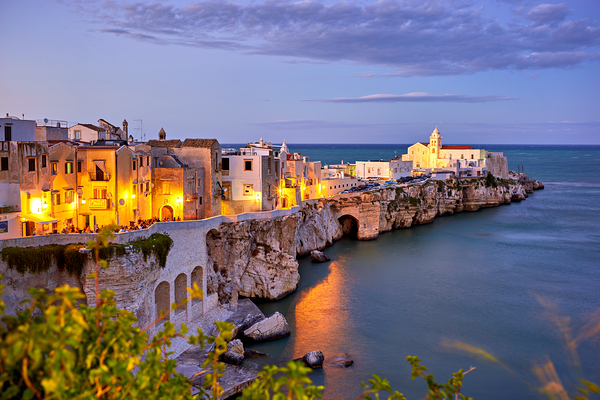 Vieste Gargano. Apulia Puglia Italy. Cape San Francesco and San Francesco church at sunset Print
