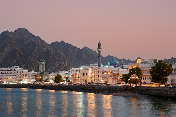 Oman. Muscat. Cityscape at sunset Print