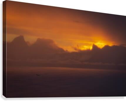 Plane at sunset Canvas Print