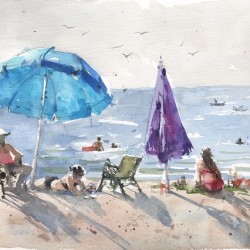 Under an umbrella in the sun