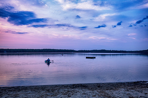 Paddleboarding at Sunset Twin Lakes Pennsylvania.