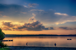 Two Swimmers at Sunset Poconos Pennsylvania