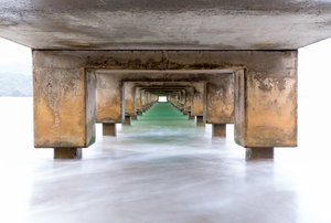 Underside of Hanalei Pier long exposure