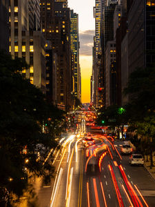 Traffic streams on 42nd street in NY after sunset