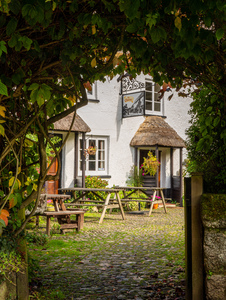 Thatched pub garden in Lustleigh in Devon