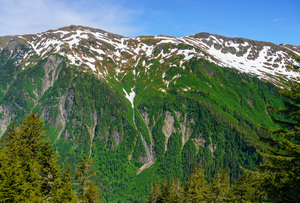 View from Mount Roberts toward Mt Juneau with waterfall in Alask