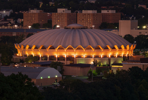 Illuminted Coliseum at WVU at dusk