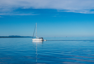 Yacht sailing peacefully across Lake Champlain