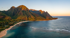 Aerial drone shot of Tunnels Beach at sunrise on Kauai in Hawaii
