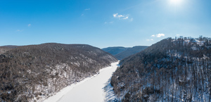 Aerial view up the frozen Cheat River in Morgantown WV
