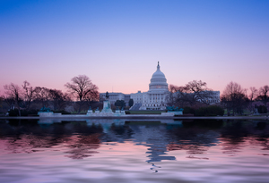 Sunrise behind the dome of the Capitol in DC