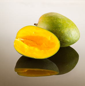 Two mangoes on reflecting surface Print