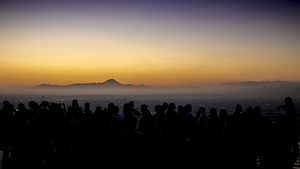 Tourists are enjoying breathtaking sunrise over mount fuji