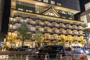 Osaka Shin Kabuki za theatre glowing at night 