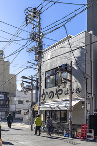 Pedestrians walking on a japanese street