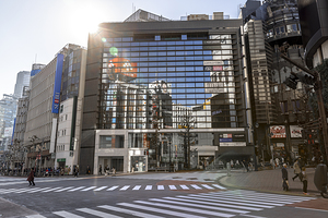 Sunlight reflecting on modern glass building in shinjuku tokyo