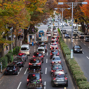 Omotesando Cars stuck in traffic jam on multi lane road 