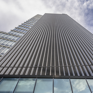 Modern office building facade soaring into the sky