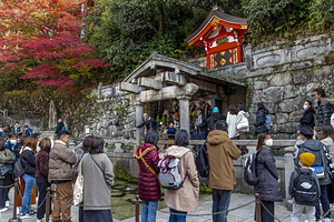 Tourists admiring the architecture of kiyomizu-dera temple in ky