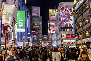 Tourists and locals walking in shinsaibashi osaka