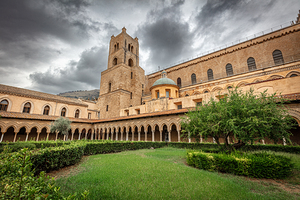 The cloister of the monreale cathedral with its characteristic p