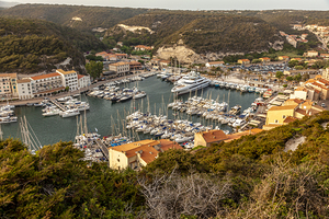 Bonifacio in Corsica harbor with boats. Mediterranean France.