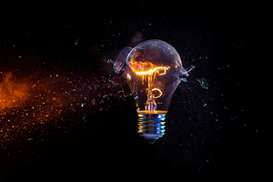 Struck electric bulb breaks into fragments tungsten filament li