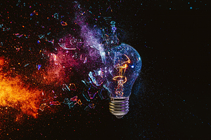 filament bulb breaking on black background high-speed photograp