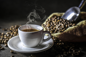 cup with steaming Italian coffee