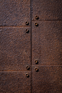 rusted and inbolted metal plates