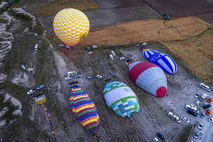 hot air balloons are deflated after the tourist flight.