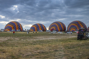 balloons of the same color are inflated for flight.