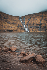waterfalls that flow into the lake of Saksun in the Faroe