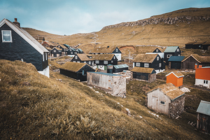 Group of houses with grass roof in the village of mykines