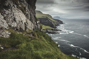 view of the coast of the island of Mykines in the Faroe Islands.