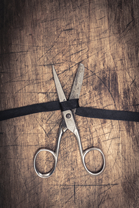 black ribbon cutting scissors